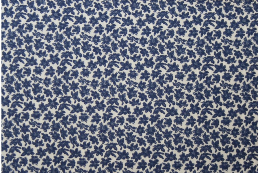 10cm Baumwolldruck aus EU-Produktion blaue Blümchen auf Wollweiss  (Grundpreis € 17,00/m) 